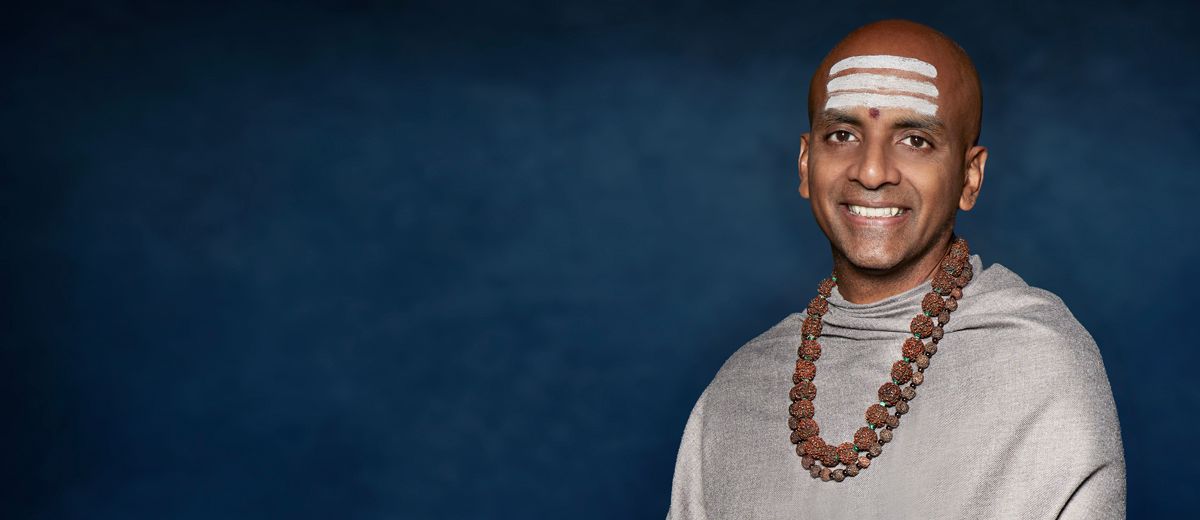 A family of two laughing together