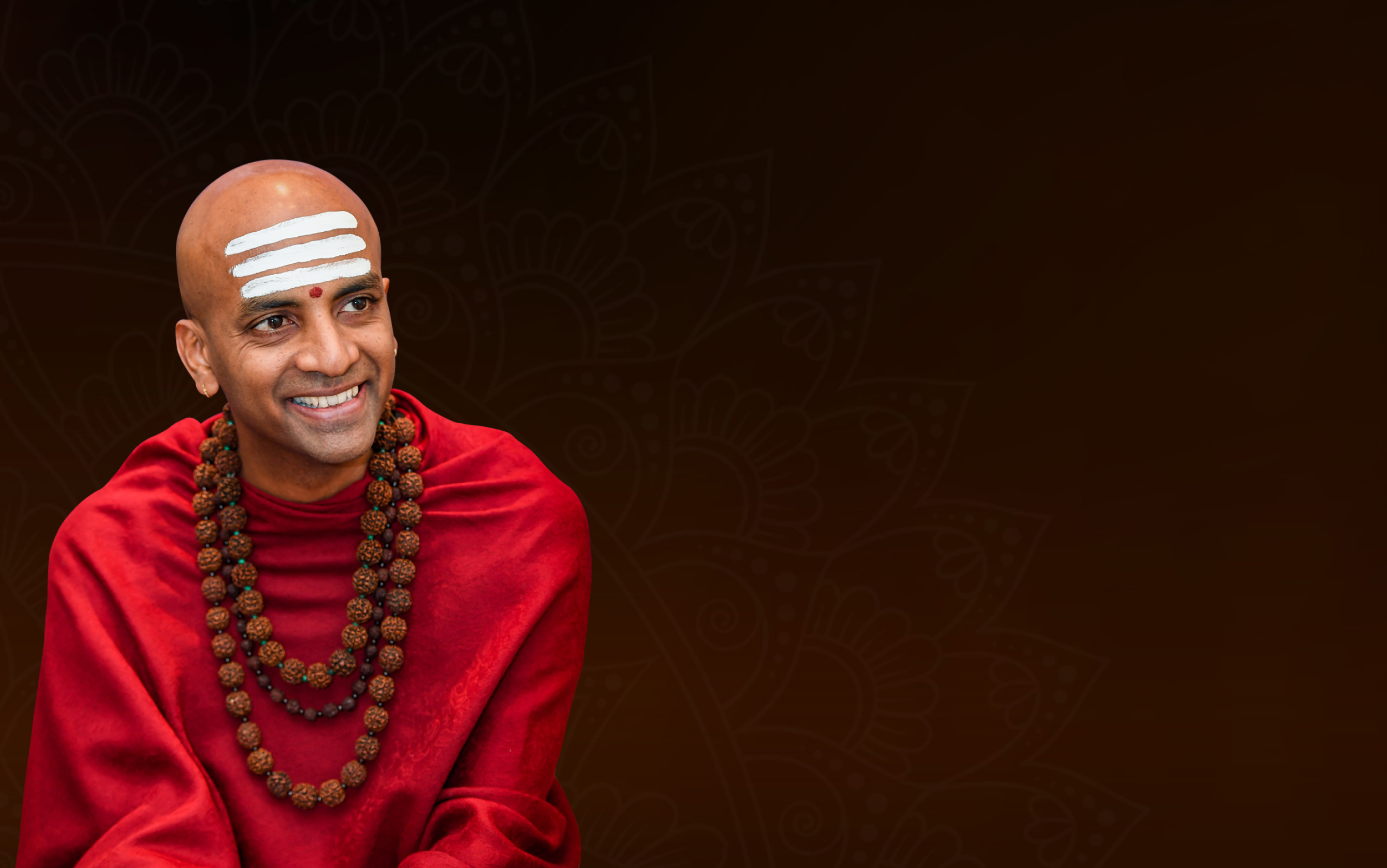 Picture of Dandapani in red robes